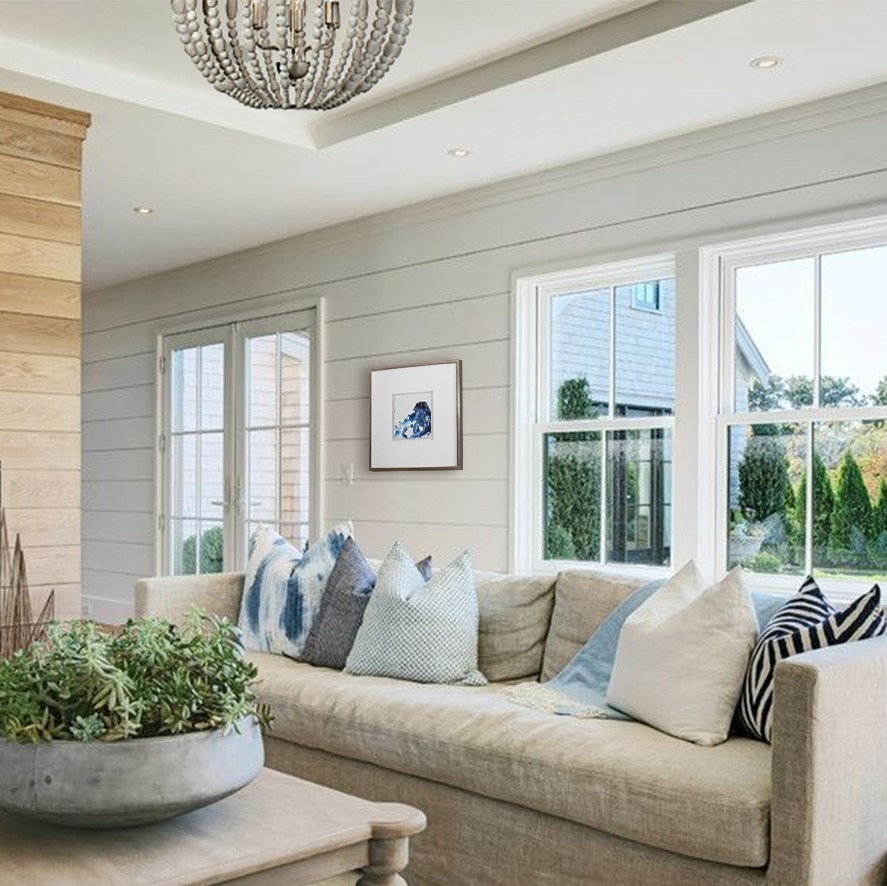Photo of a medium sized beach style formal open plan living room in Charleston with white walls, medium hardwood flooring, a two-sided fireplace, a wooden fireplace surround, no tv and brown floors.