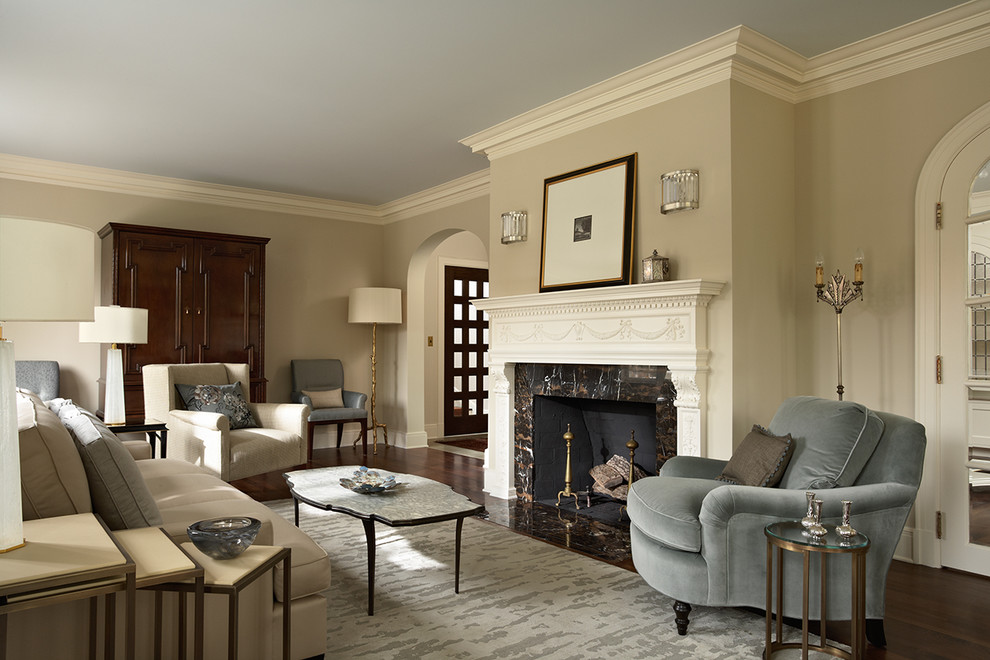 Inspiration for a timeless formal dark wood floor living room remodel in Minneapolis with beige walls, a standard fireplace, a stone fireplace and no tv