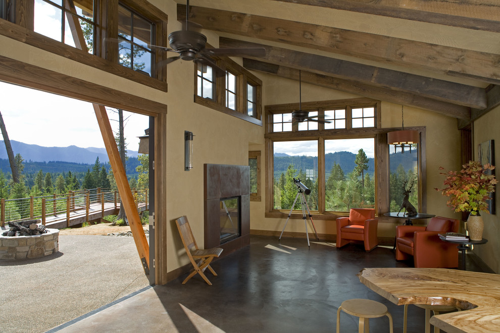 Photo of a medium sized rustic formal open plan living room in Seattle with beige walls, concrete flooring and no tv.