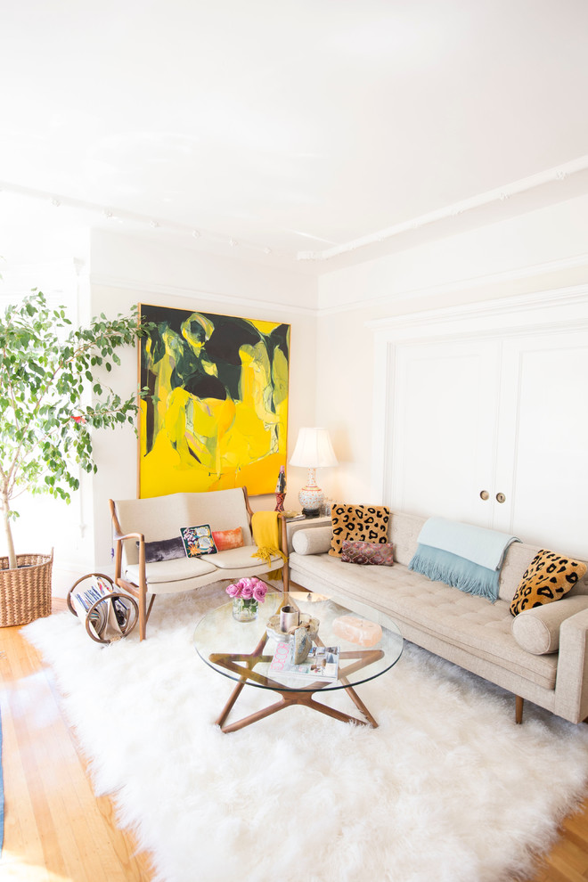 Inspiration for a small 1950s enclosed and formal light wood floor living room remodel in Los Angeles with beige walls