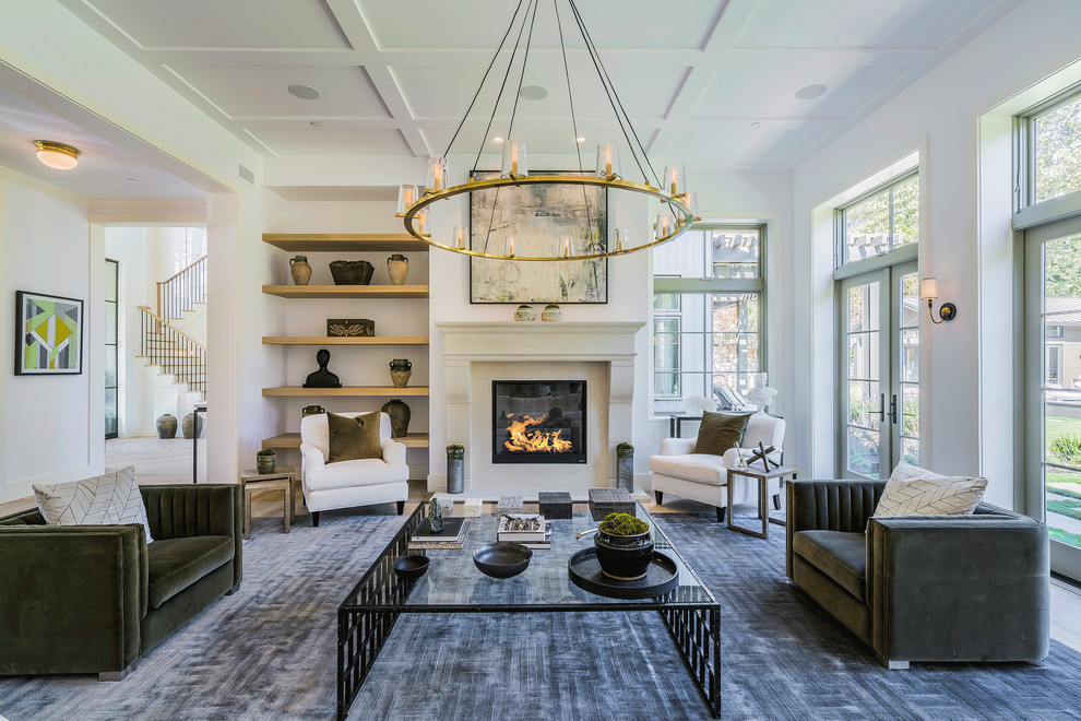 Photo of an expansive contemporary formal open plan living room in Los Angeles with white walls, a standard fireplace, a stone fireplace surround, light hardwood flooring, no tv and grey floors.