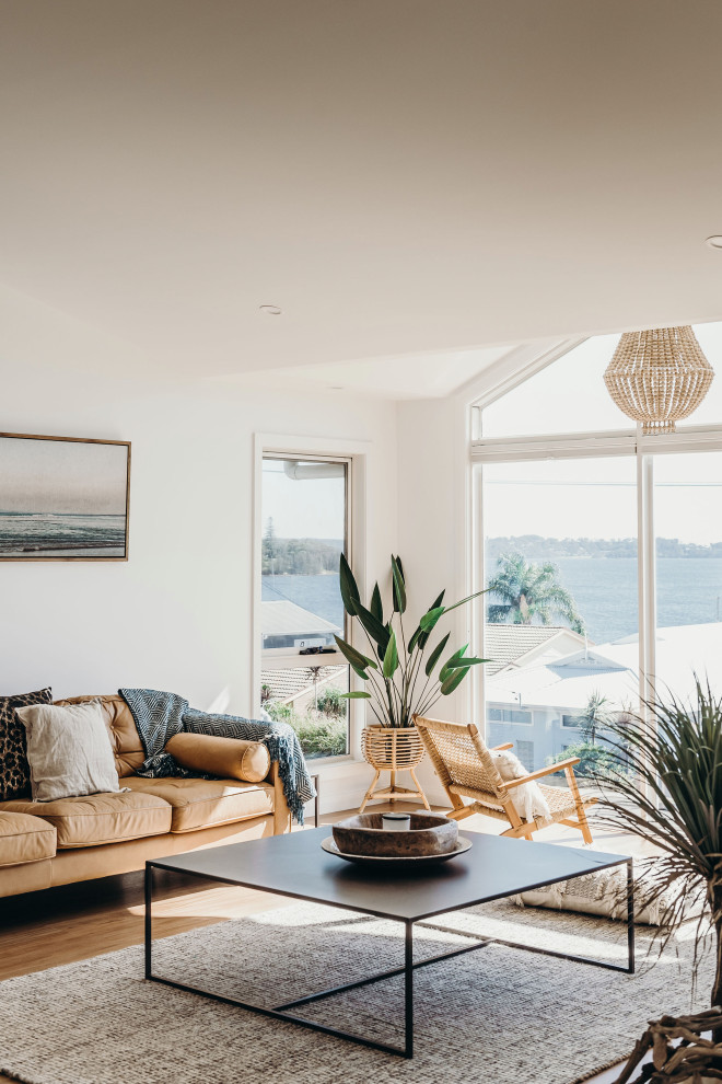 Beach style living room in Central Coast.