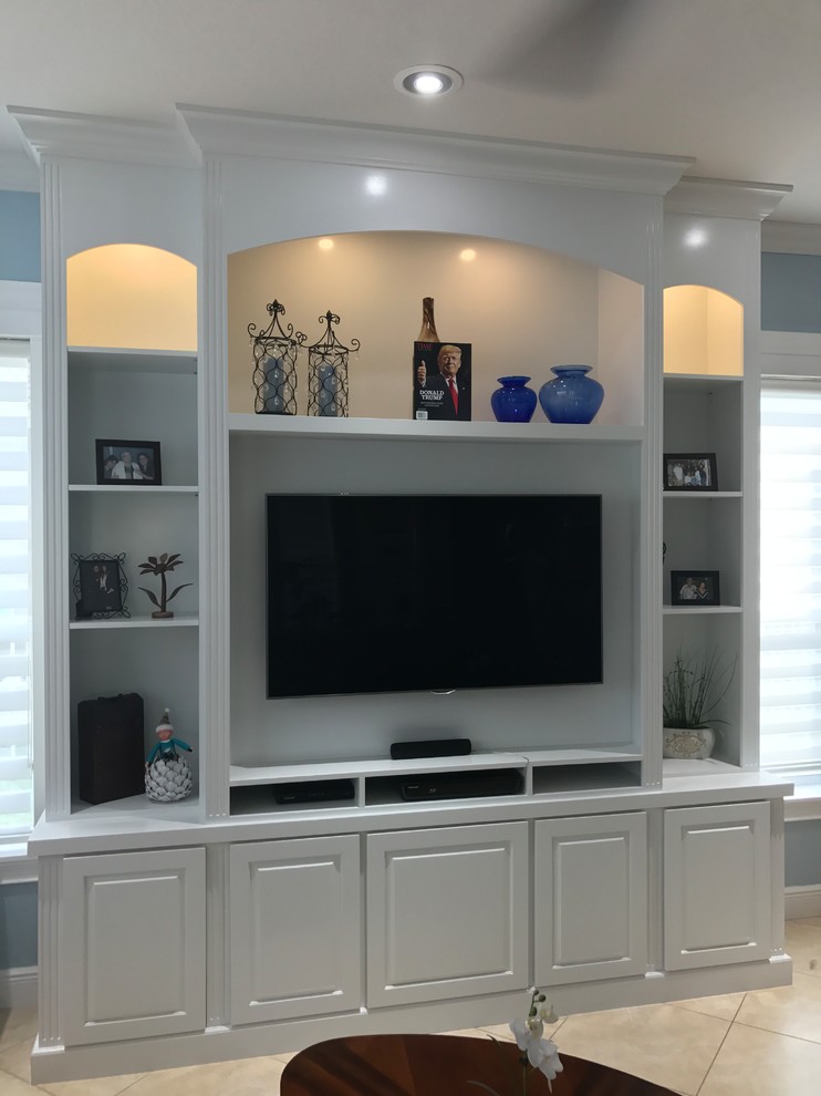 Medium sized contemporary open plan living room in Miami with blue walls, ceramic flooring and a built-in media unit.