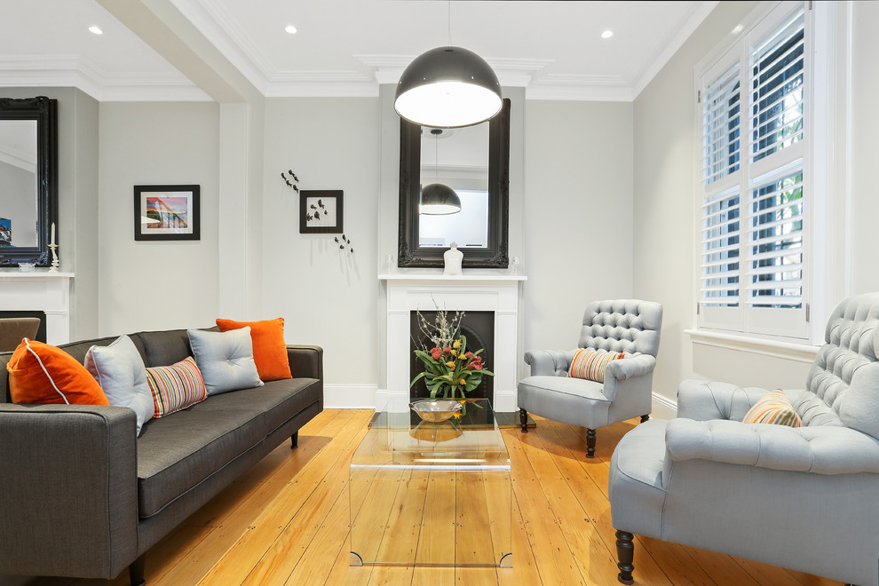 Mid-sized ornate formal living room photo in Sydney with gray walls and no tv