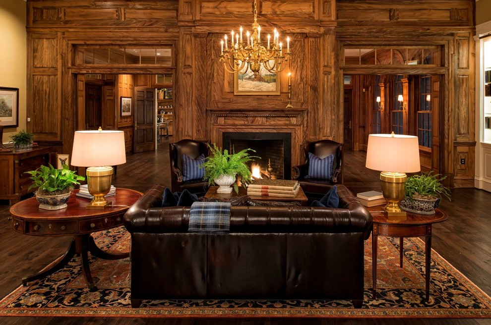 Cette image montre un grand salon traditionnel fermé avec une salle de réception, un mur beige, parquet foncé, une cheminée standard et un manteau de cheminée en bois.