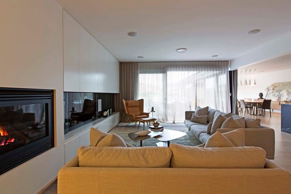 Example of a trendy living room design in Sydney
