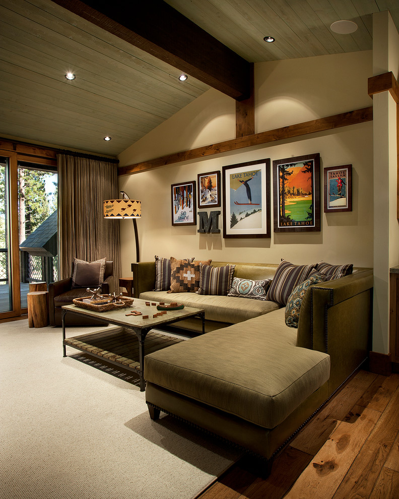 Rustic living room in Sacramento with beige walls and dark hardwood flooring.