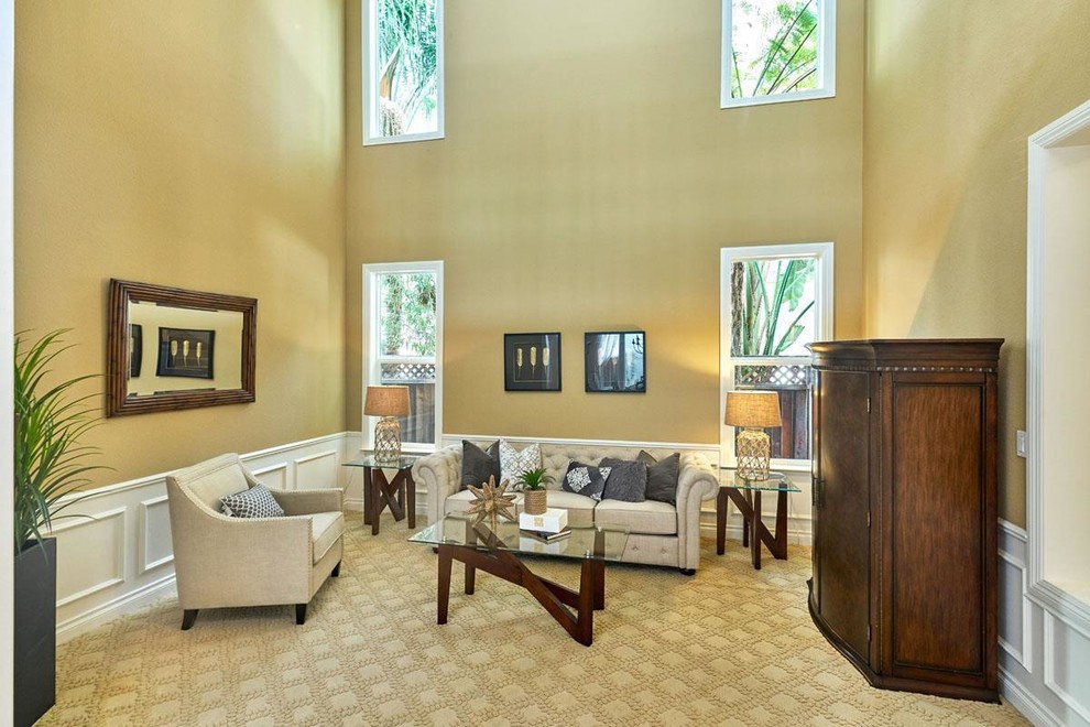 Photo of a medium sized traditional formal enclosed living room in San Francisco with beige walls, carpet, no fireplace, no tv and beige floors.