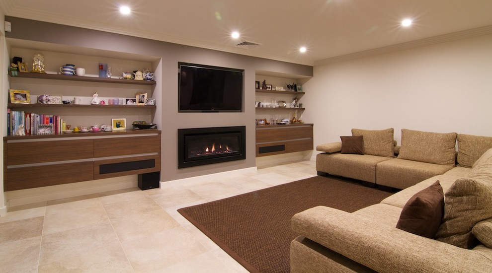 Esempio di un soggiorno contemporaneo di medie dimensioni con pavimento in travertino e pavimento beige