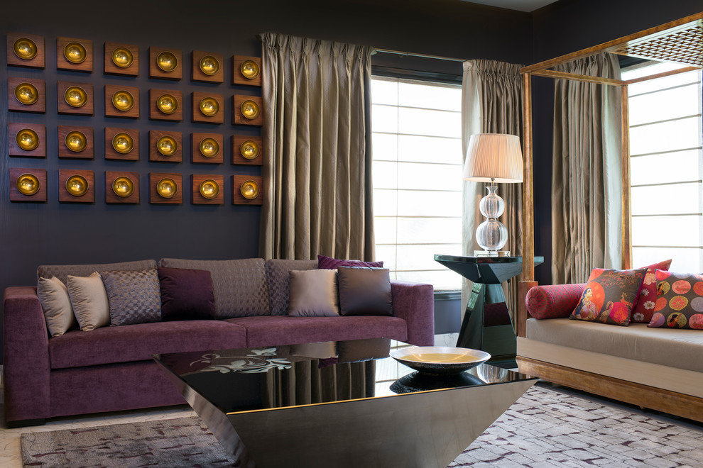 This is an example of a world-inspired living room in Delhi with feature lighting.