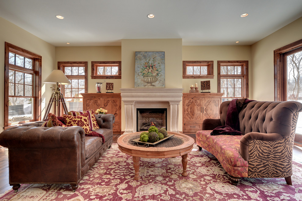 Design ideas for a classic formal living room in Minneapolis with beige walls and a standard fireplace.
