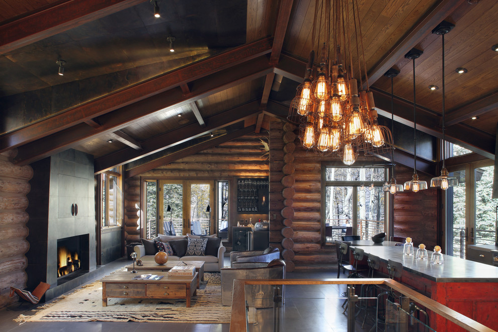 This is an example of a large rustic open plan living room in Denver.