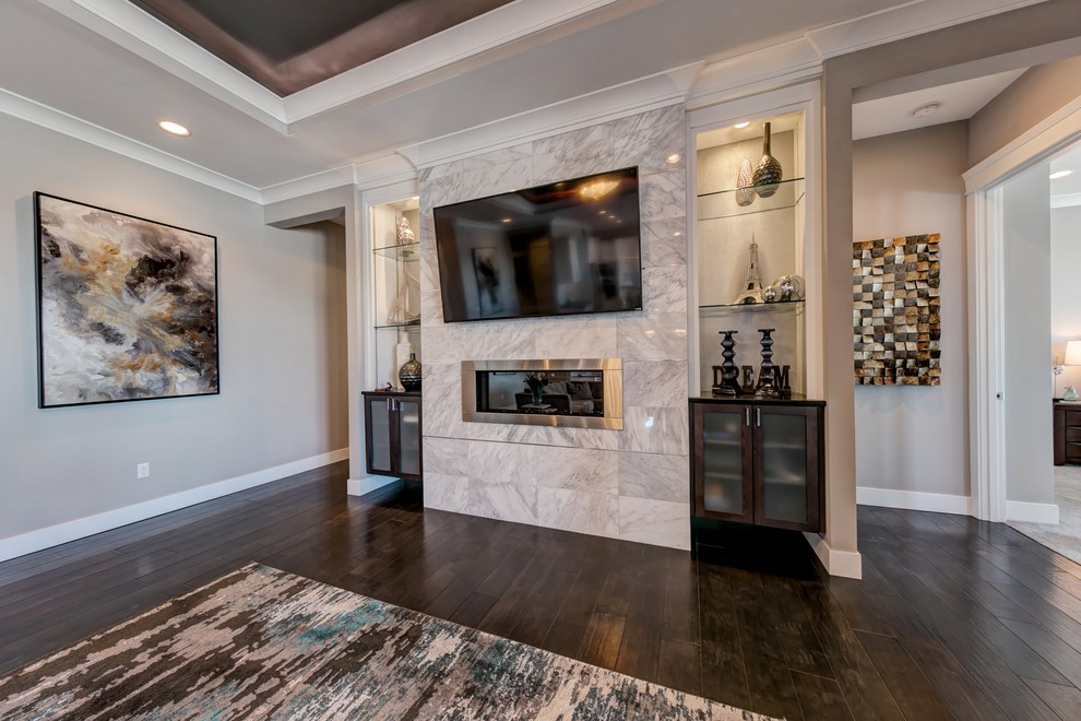 Large classic open plan living room in Seattle with grey walls, dark hardwood flooring, a ribbon fireplace, a tiled fireplace surround and a built-in media unit.