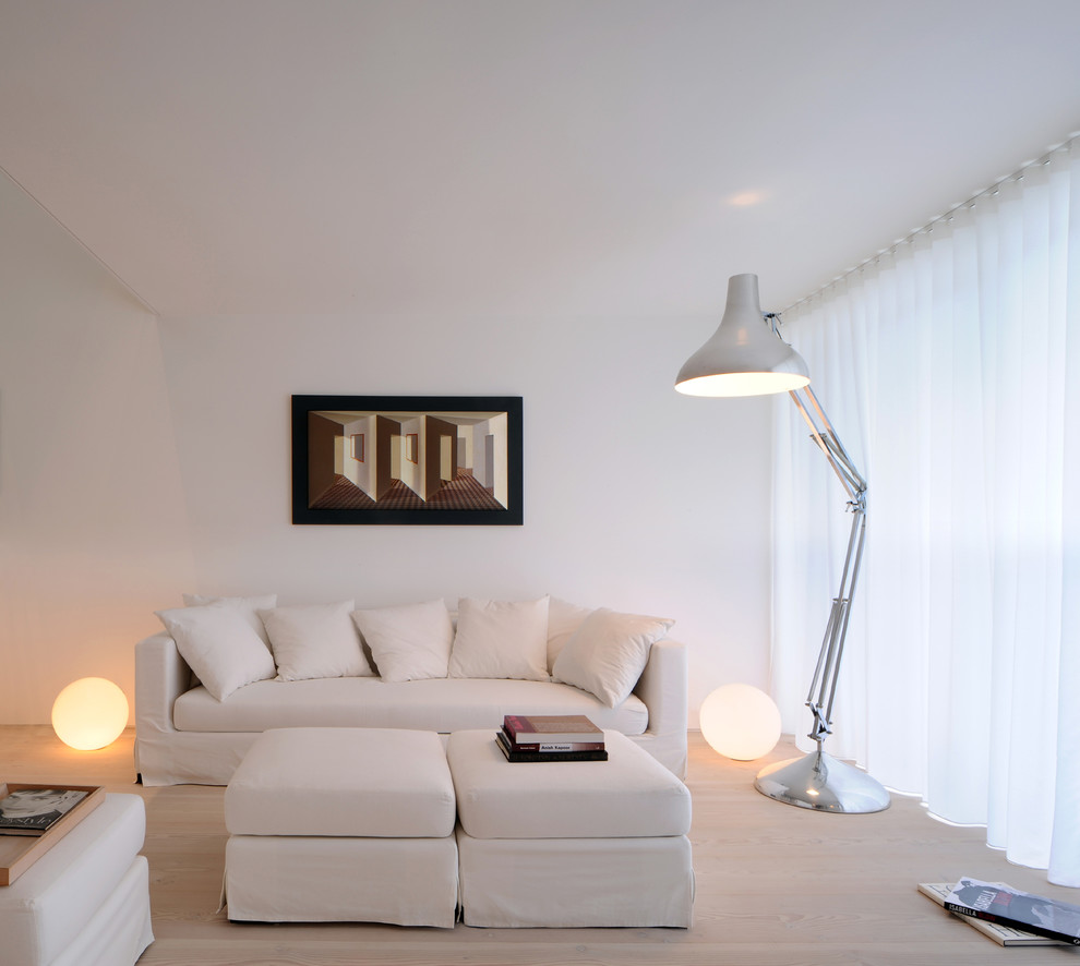 Living room - small scandinavian open concept and formal light wood floor living room idea in London with white walls