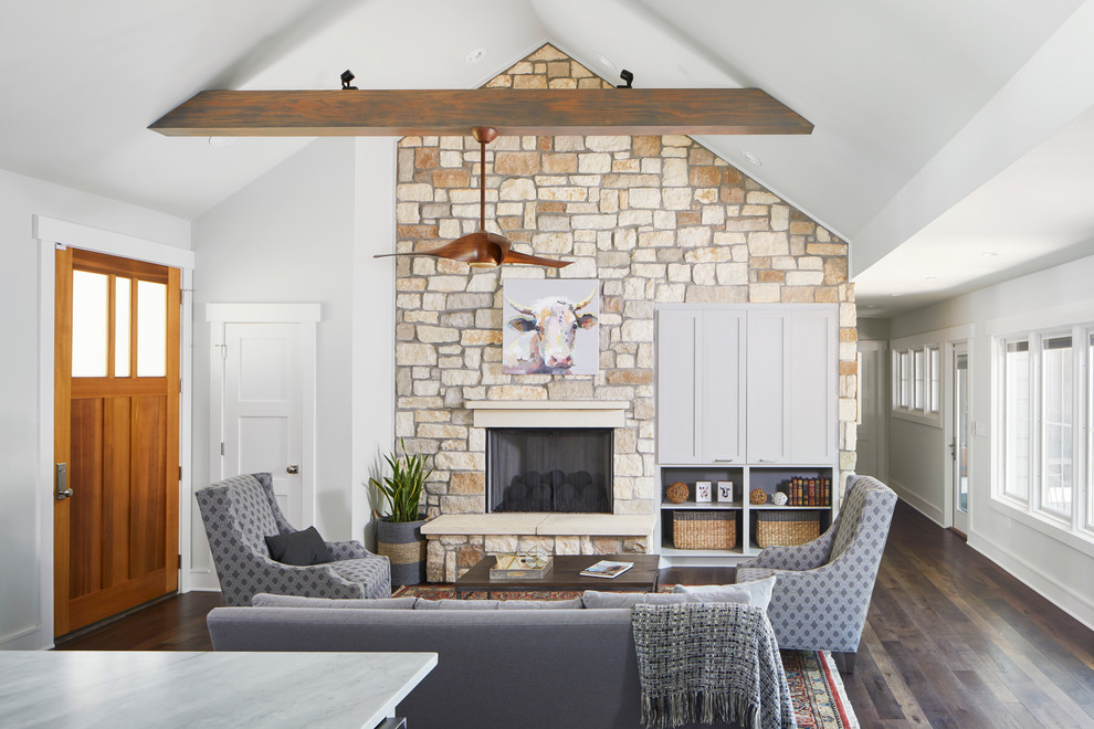 Inspiration for a small farmhouse formal open plan living room in Austin with grey walls, dark hardwood flooring, a standard fireplace, a stone fireplace surround, a built-in media unit and grey floors.