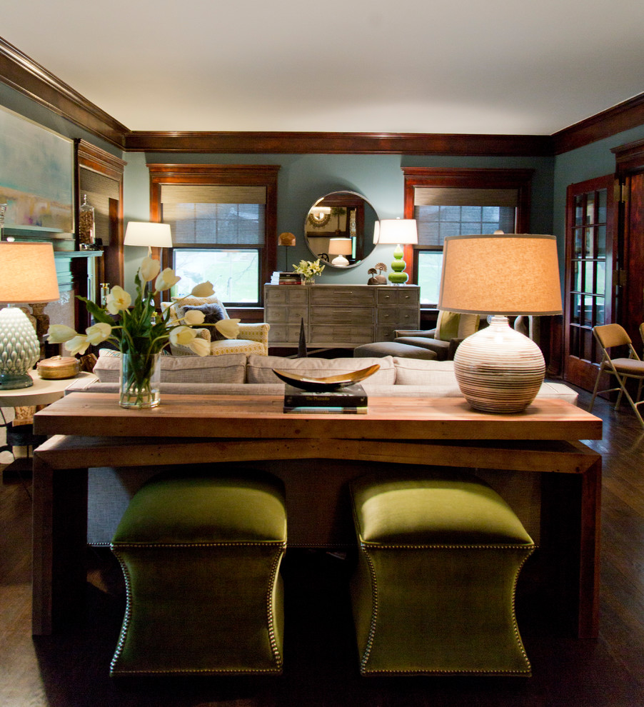 Example of a large arts and crafts formal and enclosed dark wood floor and brown floor living room design in Kansas City with gray walls, a standard fireplace and a tile fireplace