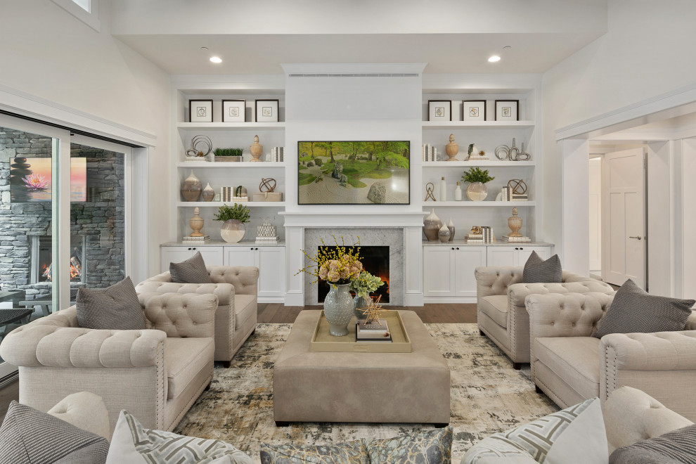 Large transitional open concept medium tone wood floor and brown floor living room photo in Seattle with white walls, a wall-mounted tv, a standard fireplace and a tile fireplace