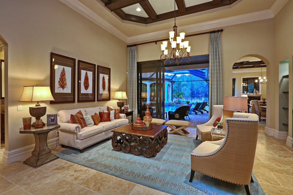 Example of a large classic formal and enclosed travertine floor living room design in Tampa with beige walls