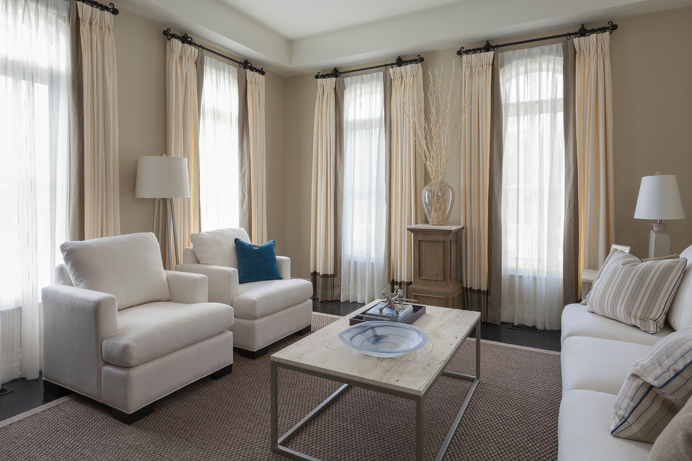 На фото: парадная, изолированная гостиная комната в стиле неоклассика (современная классика) с бежевыми стенами и темным паркетным полом без камина, телевизора с
