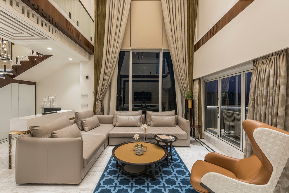 Foto di un soggiorno minimal aperto con pareti beige e pavimento beige