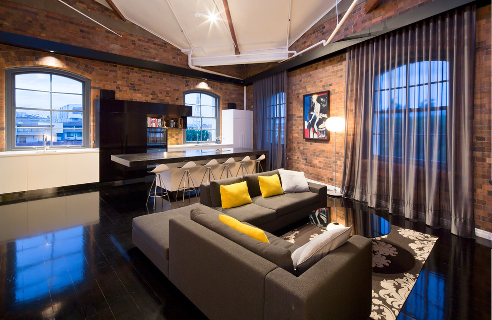 Urban open concept dark wood floor and black floor living room photo in Brisbane with no fireplace