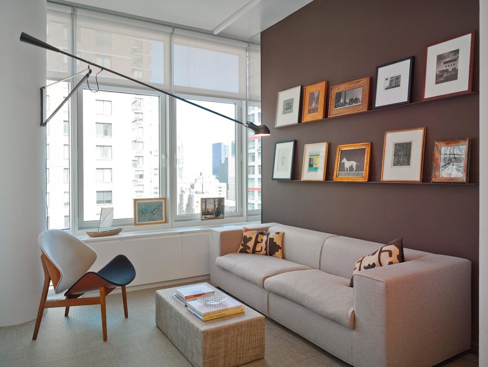Inspiration for a contemporary living room remodel in New York with brown walls