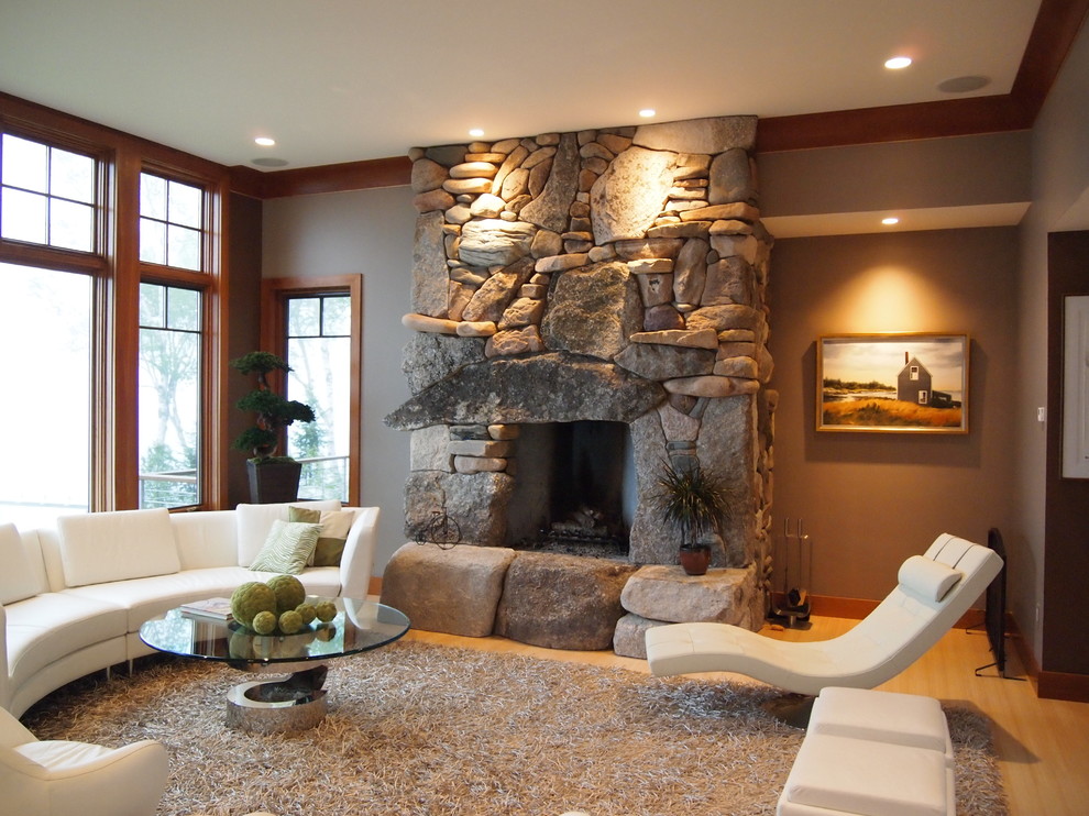 Immagine di un soggiorno design con pareti grigie