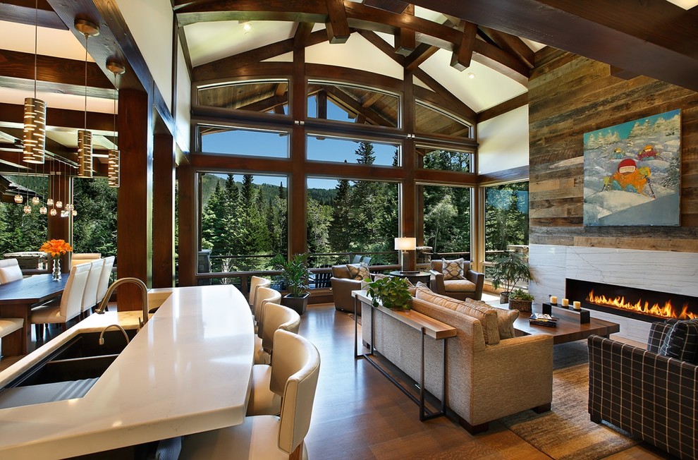 Inspiration for a large craftsman open concept and formal light wood floor living room remodel in Salt Lake City with white walls, a standard fireplace, a stone fireplace and no tv