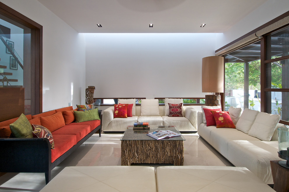 Пример оригинального дизайна: гостиная комната среднего размера в современном стиле с бетонным полом