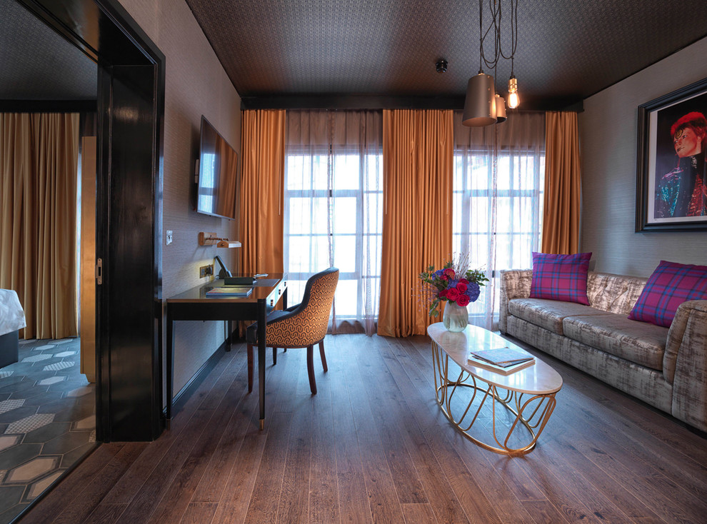 Medium sized classic living room in London with grey walls, dark hardwood flooring, grey floors and a wall mounted tv.