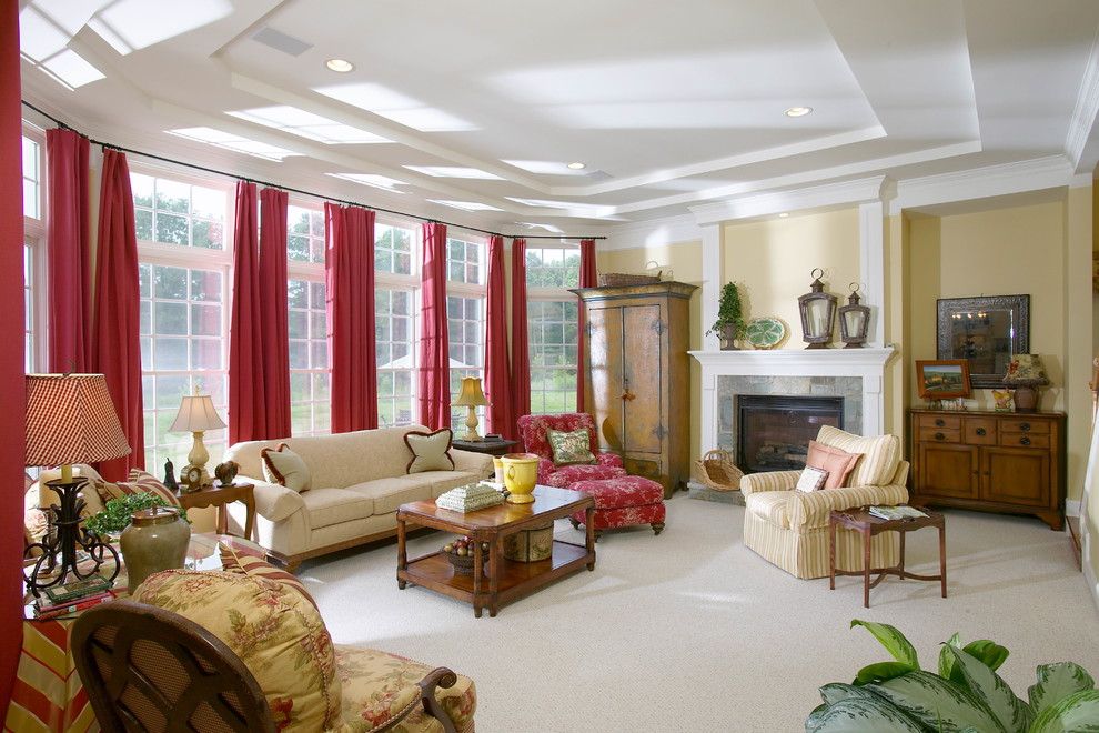 Traditional formal enclosed living room in DC Metro with yellow walls, carpet, a standard fireplace, a stone fireplace surround and no tv.