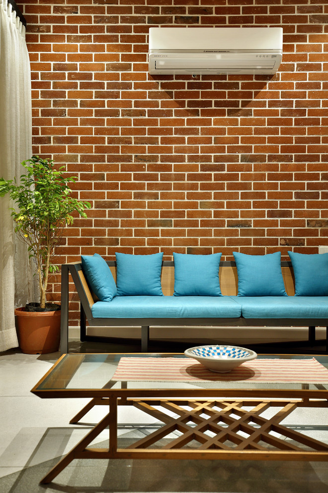This is an example of a world-inspired living room in Ahmedabad.