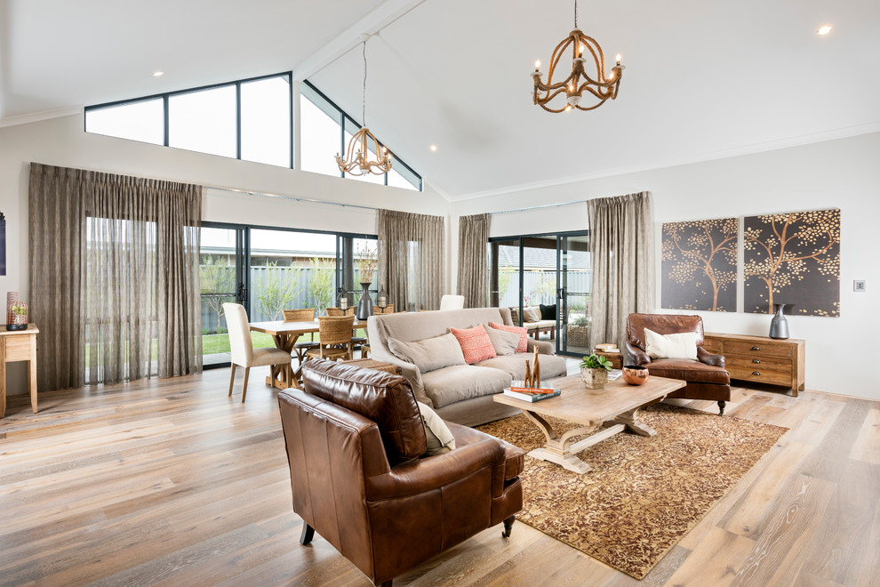 Large contemporary open plan living room in Perth with grey walls and vinyl flooring.