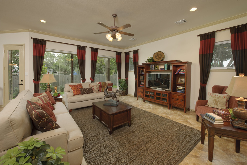 Immagine di un soggiorno classico con sala formale, pareti beige, pavimento in gres porcellanato, TV autoportante e pavimento beige