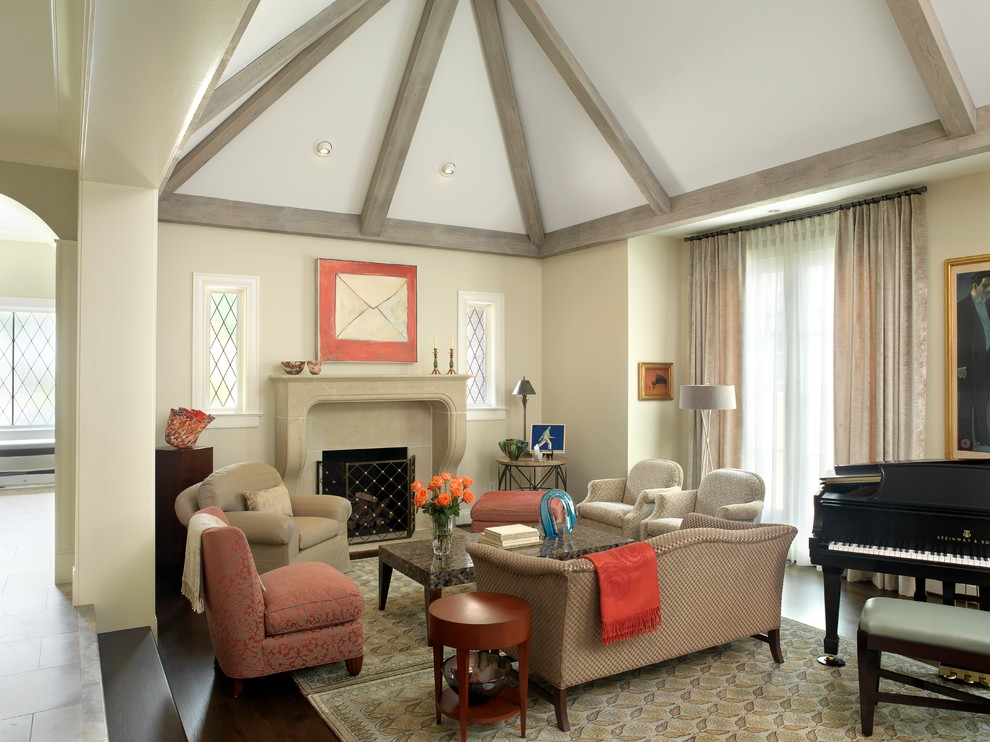 Стильный дизайн: гостиная комната в классическом стиле с музыкальной комнатой, бежевыми стенами и стандартным камином - последний тренд