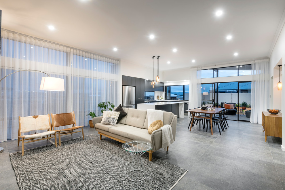 Esempio di un soggiorno minimalista aperto con pareti bianche, pavimento con piastrelle in ceramica, TV autoportante e pavimento grigio