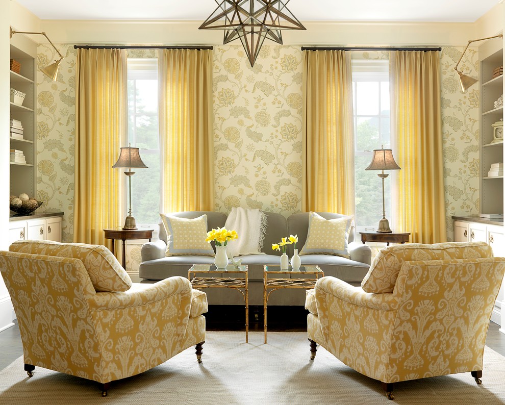 This is an example of a beach style grey and yellow living room in St Louis with beige walls.