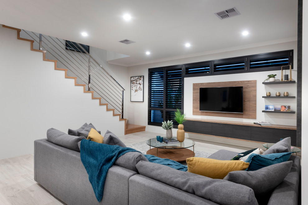 Inspiration for a large contemporary carpeted and gray floor living room remodel in Perth with white walls and a wall-mounted tv