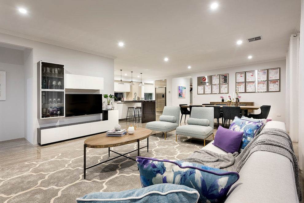 Esempio di un soggiorno minimalista di medie dimensioni e aperto con pareti bianche, pavimento in gres porcellanato e TV a parete