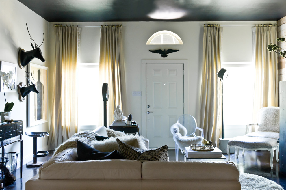 This is an example of an eclectic living room curtain in Dallas with white walls.