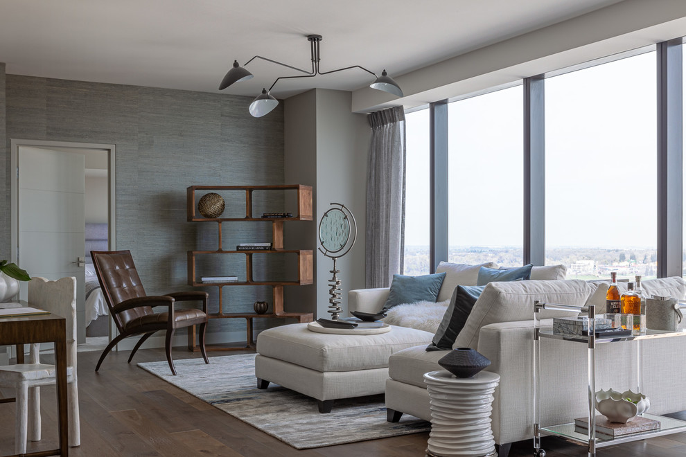 Contemporary open plan living room in Sacramento with grey walls, dark hardwood flooring and brown floors.