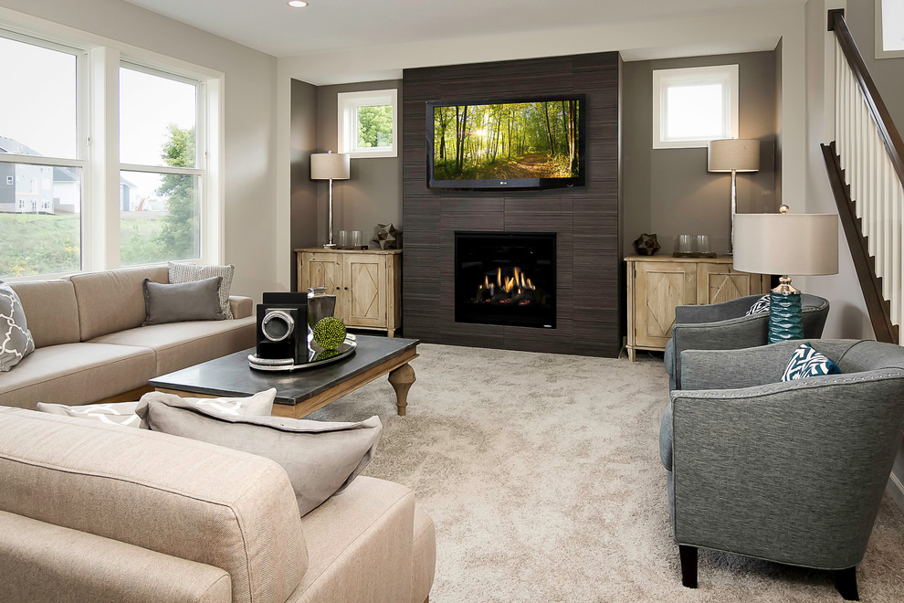 Example of a mid-sized trendy formal and enclosed carpeted living room design in Minneapolis with gray walls, a standard fireplace, a tile fireplace and a wall-mounted tv