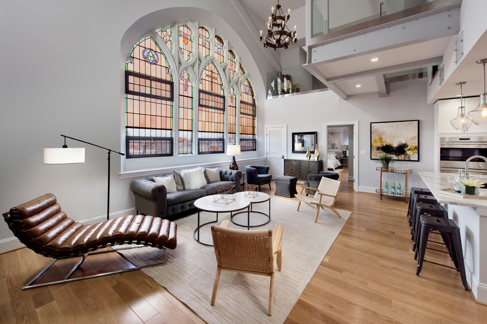 Living room - victorian open concept light wood floor and beige floor living room idea in DC Metro with gray walls