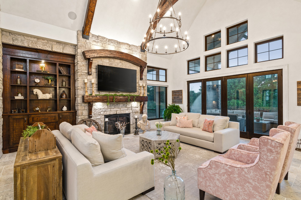 Inspiration for a huge cottage formal and open concept travertine floor and multicolored floor living room remodel in Cincinnati with multicolored walls, a standard fireplace, a stone fireplace and a wall-mounted tv