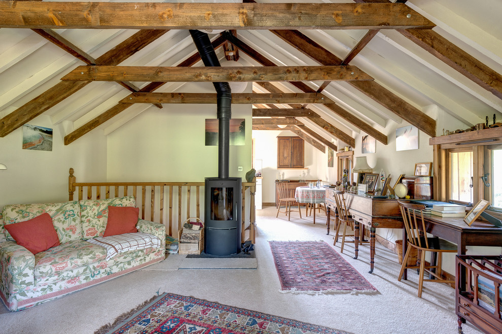 Design ideas for a rural enclosed living room in Devon with a wood burning stove.