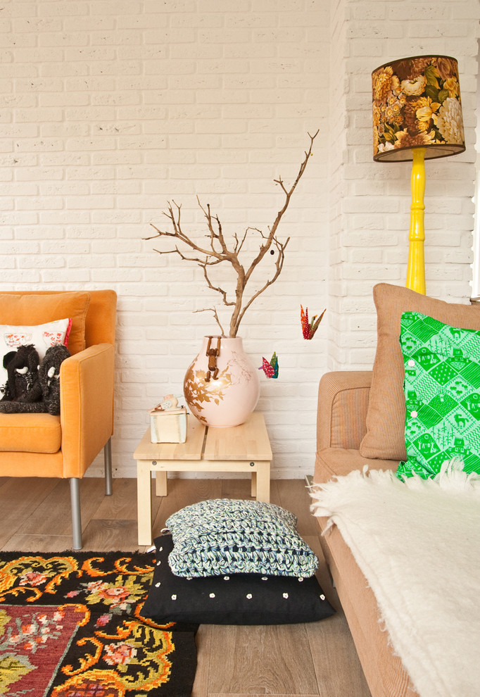 Living room - eclectic living room idea in Amsterdam with white walls