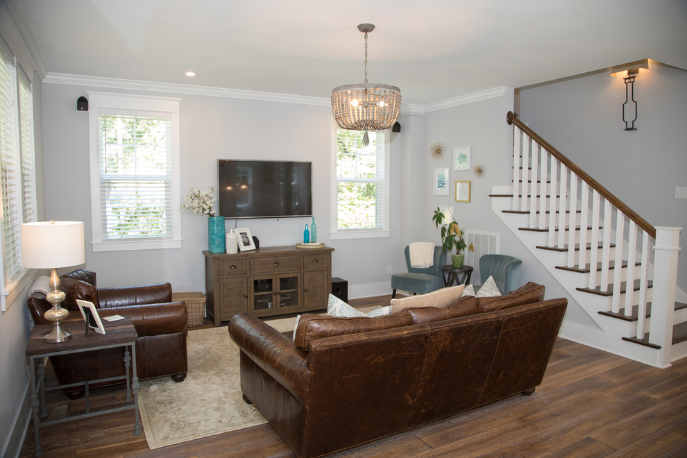 Photo of a coastal living room in Other with grey walls, no fireplace and a wall mounted tv.