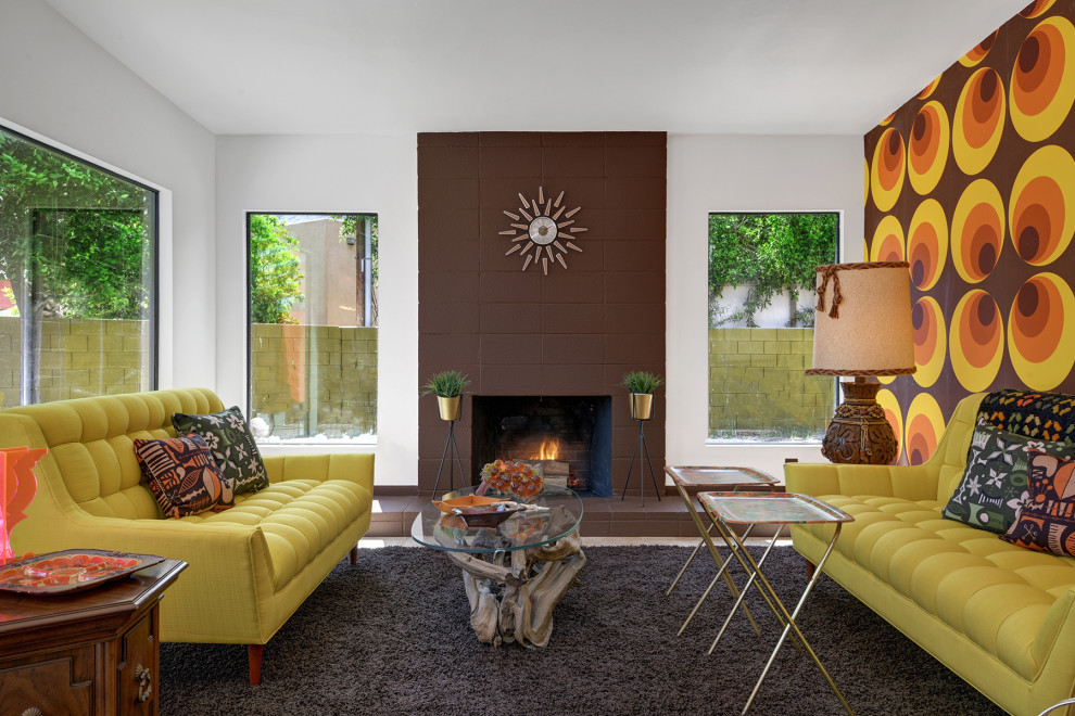 Retro formal living room in Other with multi-coloured walls, a standard fireplace and a tiled fireplace surround.