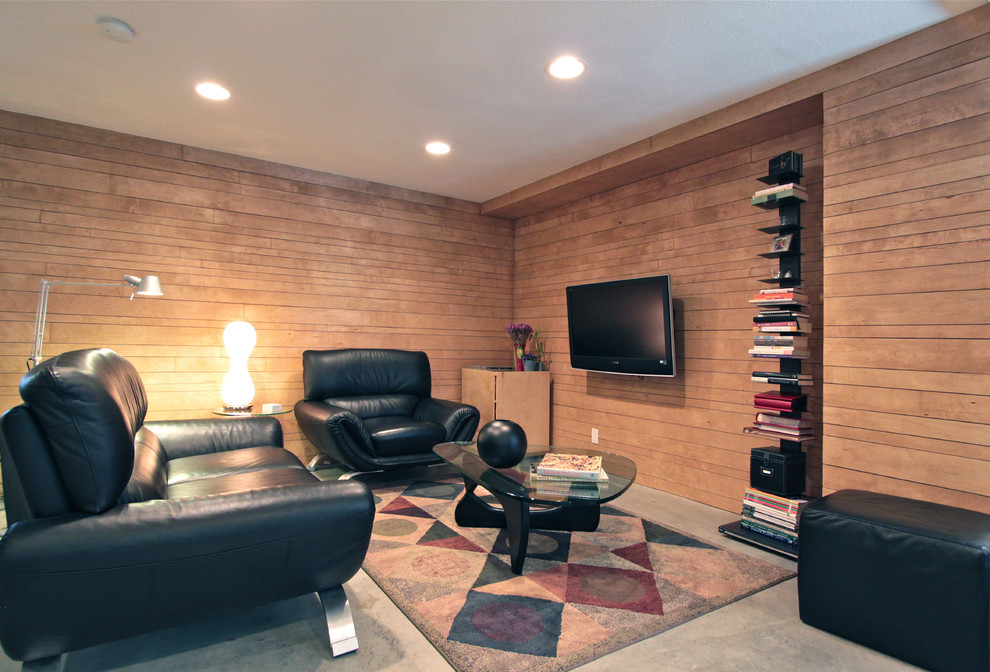 Photo of a small modern open plan living room in Seattle with brown walls, concrete flooring, no fireplace and a wall mounted tv.
