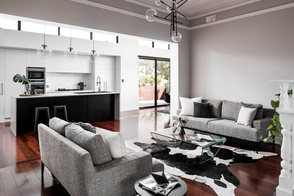 Example of a trendy formal and enclosed dark wood floor and brown floor living room design in Perth with gray walls